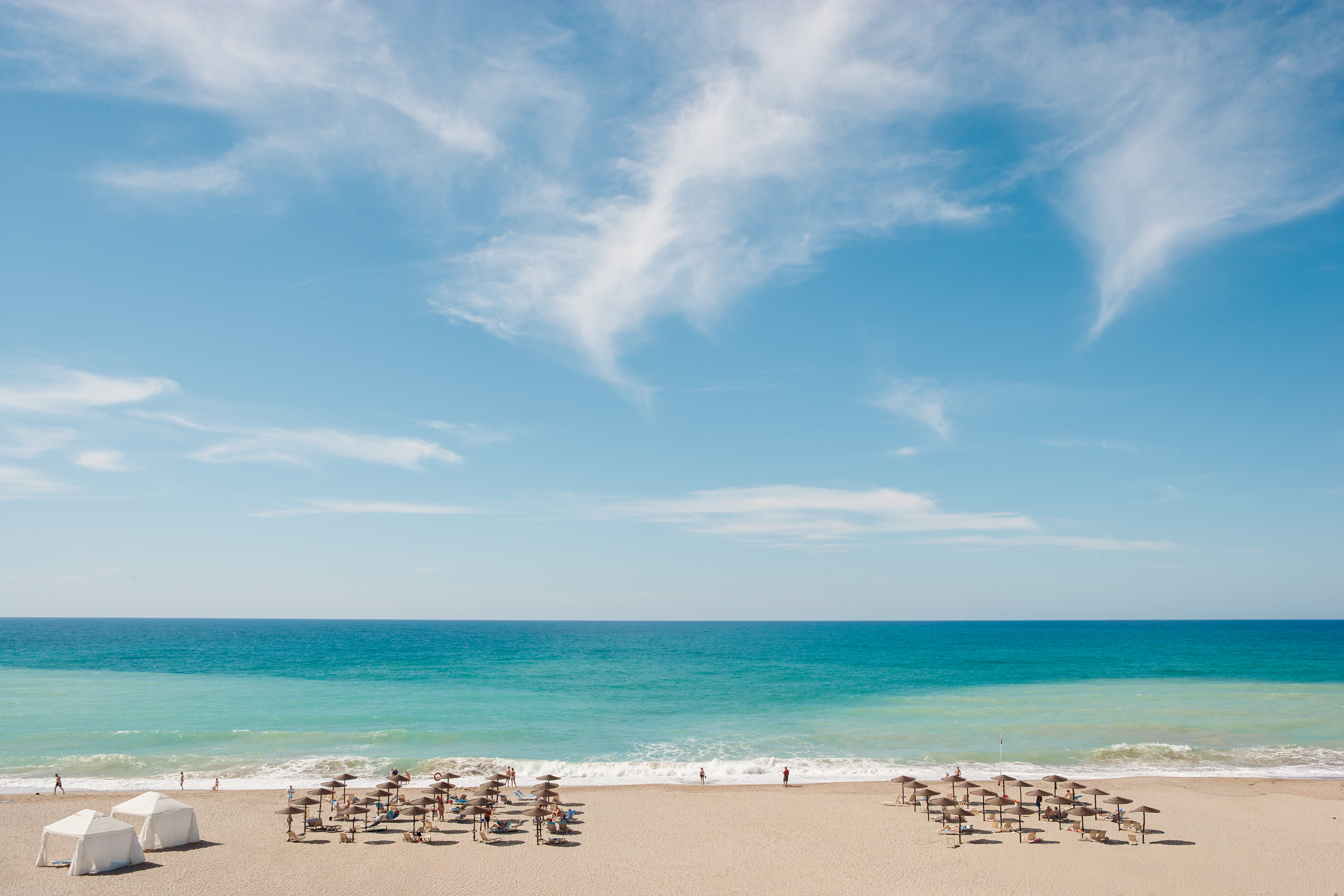02-Creta-Palace-features-an-endless-white-sandy-beach-with-crystal-clear-blue-waters-for-relaxing-days
