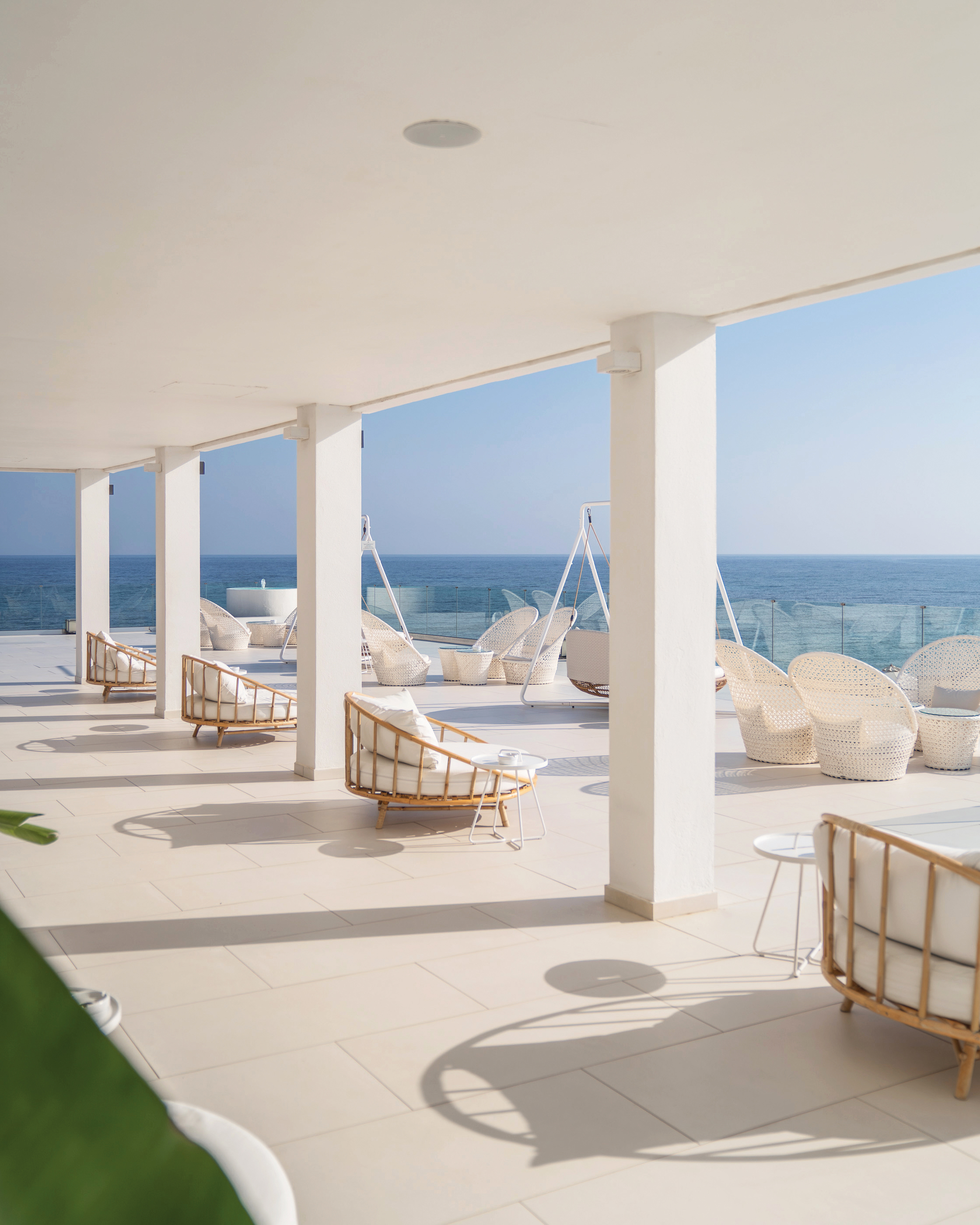 04-luxme-white-seaside-rooftop-seating-area