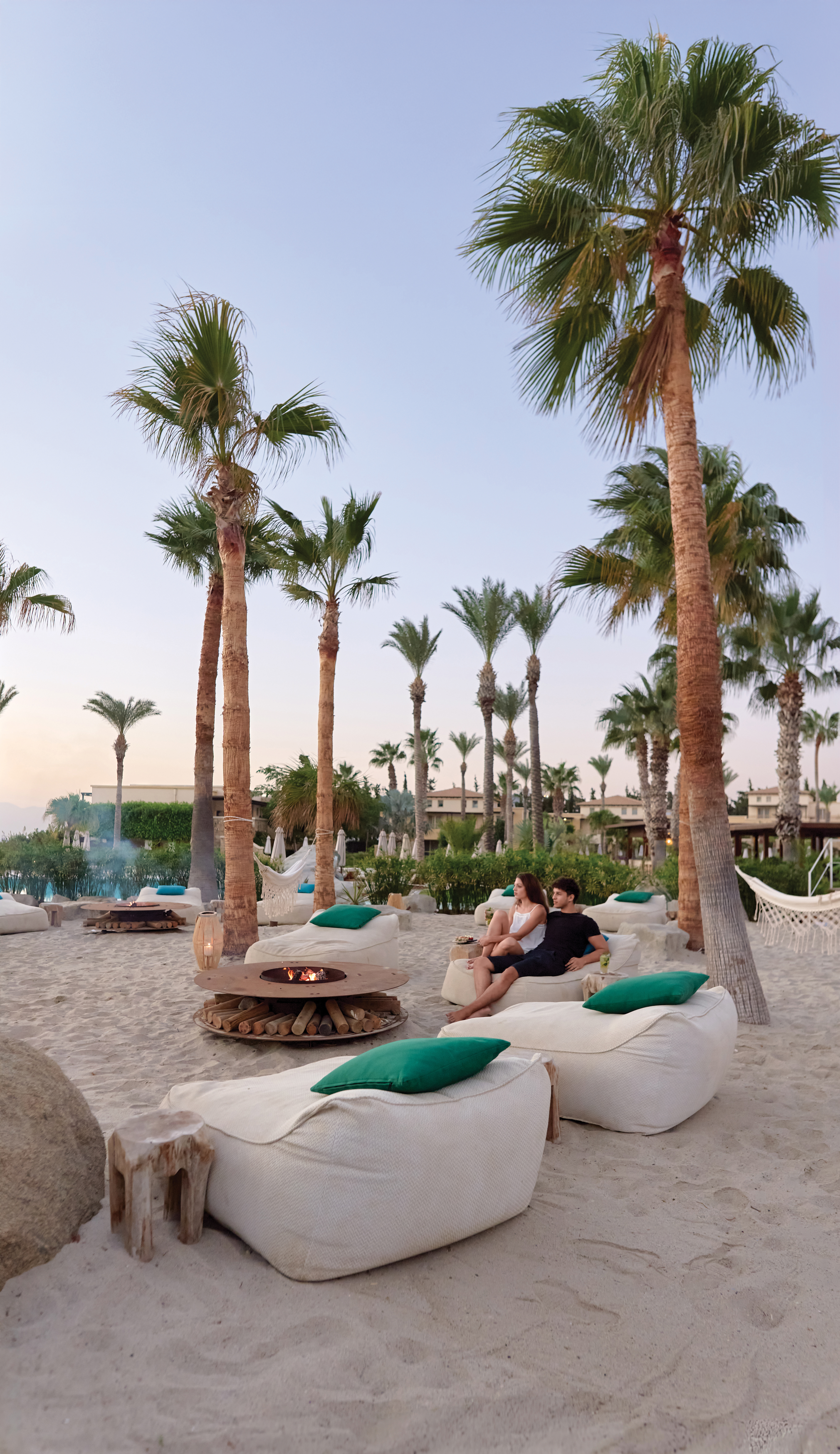 05-tropical-gardens-surrounding-a-beautiful-sandy-beach-for-relaxation